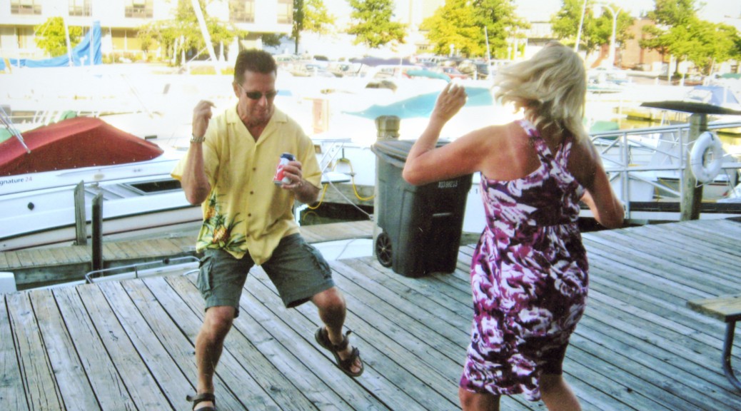 People dancing on dock
