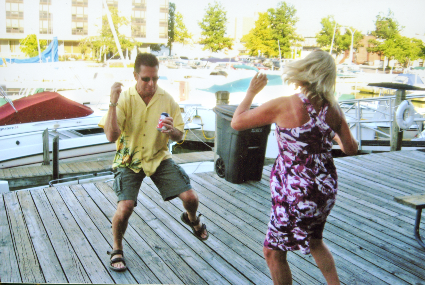 People dancing on dock